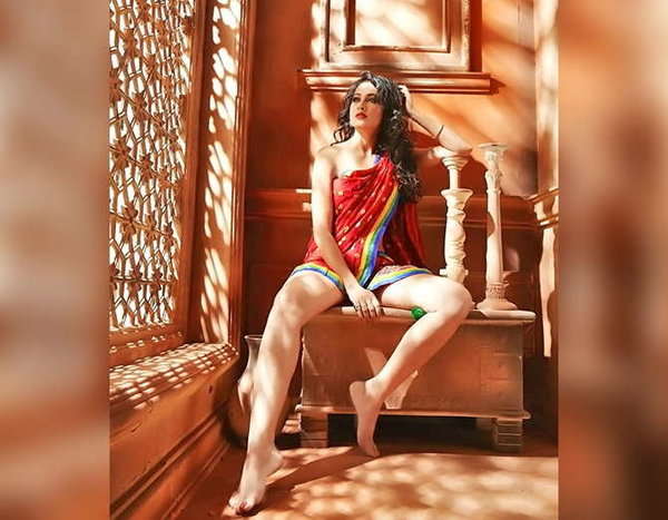 Mouni Roy looks exquisite in an unbuttoned shirt for a bold photoshoot