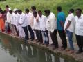 विंचूरला बंधाऱ्याचे जलपूजन - Marathi News | Watershed of a dam to Vancouver | Latest nashik News at Lokmat.com