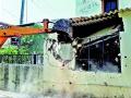 सातपूरला कारवाई : रहिवासी भागातील मोठी कारवाई पक्क्या घरांचे बांधकाम जमीनदोस्त - Marathi News | Action taken at Satpur: Major action in residential areas | Latest nashik News at Lokmat.com
