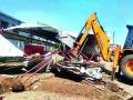 आडगावातील अनधिकृत बांधकामे उद्ध्वस्त - Marathi News | Unauthorized constructions in Gurdwara destroyed | Latest nashik News at Lokmat.com