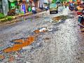 जिल्ह्यातील रस्ते गेले खड्ड्यात - Marathi News | The roads in the district went into the pits | Latest nashik News at Lokmat.com