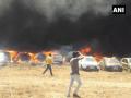 Video : बंगळुरूमधील एरो इंडिया शो दरम्यान भीषण आग, 100 कार जळून खाक - Marathi News | Bengaluru Fire breaks out at car parking area near the venue of AeroIndia2019 | Latest national News at Lokmat.com