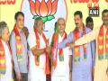 कर्नाटकातील 15 अपात्र आमदारांचा भाजपात प्रवेश  - Marathi News | 15 rebel Karnataka MLAs of Congress and JD(S) joined BJP today in the presence of Chief Minister BS Yediyurappa | Latest national News at Lokmat.com