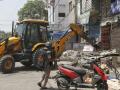 Delhi: शाहीन बागनंतर मंगोलपुरीत पोहोचले बुलडोझर, परिसरात पोलिसांचा मोठा फौजफाटा तैनात - Marathi News | Delhi: Bulldozers reach Mangolpuri after Shaheen Bagh, large police force deployed in the area | Latest national News at Lokmat.com