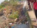 ओएनजीसीच्या हेलिपॅड नजीकच्या नाल्यातील कचऱ्याला आग  - Marathi News | Garbage in a drain near ONGC's helipad caught fire | Latest navi-mumbai News at Lokmat.com