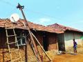 घरांवर कोसळले विजेचे खांब - Marathi News | Lightning pillars damaged at home | Latest raigad News at Lokmat.com