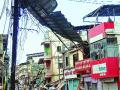 बोर्र्लीपंचतन बाजारपेठेत वीजवाहक तारांवर अडकले पत्रे - Marathi News | Letters stuck on power lines in Borlipanchatan market | Latest raigad News at Lokmat.com
