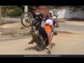 VIDEO : बाइक चालवताना तरूणीने वर उचललं समोरचं चाक आणि मग... - Marathi News | Girl lifted the first wheel of the bike in the air watch what happen then | Latest social-viral News at Lokmat.com