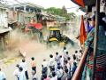 नागपुरातील केळीबाग रोडवर चालला बुलडोजर - Marathi News | Bulldozer running on Kelibag road in Nagpur | Latest nagpur News at Lokmat.com