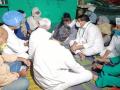 COVID positive MLA visits Hathras victim's family, booked for flouting quarantine norms - Hindi News | COVID positive MLA visits Hathras victim's family, booked for flouting quarantine norms | Latest national Photos at Lokmattimes.com