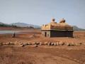 पाणी ओसरले अन् दिसले पाण्याखाली दडलेले मंदिर  - Marathi News | water receded and the temple buried under the water was seen in pune | Latest pune News at Lokmat.com