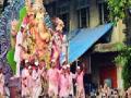 नवी मुंबईतील गणेश मिरवणुकीला पारंपरिक साज - Marathi News | Traditional Appliances in Navi Mumbai Ganesh Miravanki | Latest mumbai News at Lokmat.com
