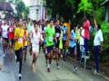 मॅरेथॉनमध्ये मोरगा,उगले विजयी - Marathi News | Moraga, the weights in the marathon | Latest thane News at Lokmat.com