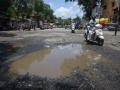 नागपुरात जराशा पावसाने रस्त्यांची दुर्दशा - Marathi News | Bad condition of roads due to light rain in Nagpur | Latest nagpur News at Lokmat.com