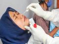 Lab workers from Indonesia caught reusing swabs for COVID-19 tests - Hindi News | Lab workers from Indonesia caught reusing swabs for COVID-19 tests | Latest international Photos at Lokmattimes.com