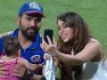 रोहितचा 'नन्ही परी' सोबतचा Quality time ! - Marathi News | Rohit Sharma captain of Mumbai Indians with wife Ritika and daughter Samaira after the match against KKR | Latest cricket Photos at Lokmat.com