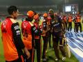 IPL 2019 : आंद्रे रसेलनं घेतली 'विशेष' व्यक्तीची भेट, जिंकली साऱ्यांची मनं - Marathi News | IPL 2019: Andre Russell's heartwarming hug to differently abled KKR fan | Latest cricket Photos at Lokmat.com