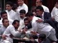 संसदेत 35 खासदार भिडले; एकमेकांना लाथाबुक्क्यांनी हाणले... - Marathi News | Big fighting in Parliament; lawmakers bets each other | Latest international News at Lokmat.com