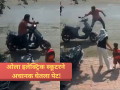 Ola Electric Scooter Fire: ओला इलेक्ट्रिक स्कूटरनं अचानक घेतला पेट; बापानं मुलासह उडी मारल्यानं अनर्थ टळला! - Marathi News | Caught on Cam: Father and son jump for life as Ola Electric scooter catches fire in Solapur | Latest solapur News at Lokmat.com