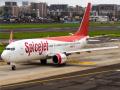 DGCAच्या कारवाईचा परिणाम; SpiceJetने 80 वैमानिकांना पगाराशिवाय सक्तीच्या रजेवर पाठवलं - Marathi News | Effect of DGCA's action; SpiceJet sent 80 pilots on compulsory leave without pay | Latest national Photos at Lokmat.com