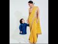 पाहा तैमुरचा ट्रेडिशनल लूकमधील अंदाज - Marathi News | taimur ali khan in traditional dress | Latest filmy Photos at Lokmat.com