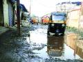 शहरामधील रस्ते ‘खड्ड्यांत’! - Marathi News | Roads in the city 'pits'! | Latest thane News at Lokmat.com