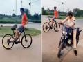 Cycle stunt : बोंबला! सायकलवर उलटं बसून स्टंट करत होता; पोलिसांना पाहताच दिली अशी रिएक्शन; पाहा व्हिडीओ - Marathi News | Police watching man doing cycle stunt on road ips gives epic reaction see viral video | Latest social-viral News at Lokmat.com