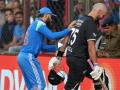 Virat Kohli Viral Video : किंग कोहलीनं आधी शतकवीर डॅरिल मिचेलला दाद दिली, मग... - Marathi News | IND vs NZ 3rd ODI Virat Kohli Appreciating The Innings Of Daryl Mitchell And Then Literally Pushing Off The Field Video Goes Viral | Latest cricket News at Lokmat.com