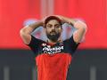 Virat Kohli RCB, IPL 2022: विराटच्या बंगळुरू संघाचं नशिबच खराब! सामने जिंकायला लागले तर आली वाईट बातमी - Marathi News | bad news for Virat Kohli RCB Fans as star bowler will not be available for next full week in IPL 2022 | Latest cricket News at Lokmat.com