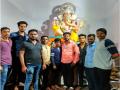 विघ्न दूर करण्यासाठी कार्यकर्ते अाले धावून - Marathi News | members of ganesh pandal came forward to help him | Latest pune News at Lokmat.com