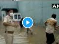 Video - पावसाचे थैमान! ....अन् साचलेल्या पाण्यात अडकली रुग्णवाहिका - Marathi News | Gujarat ambulance that was stuck under waterlogged bridge near Rajkot's Gondal | Latest national News at Lokmat.com