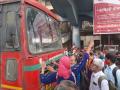 डोंबिवलीत रांगेतील प्रवाशांचा उद्रेक, एसटी बस रोखली - Marathi News | Outburst of passengers in queue at Dombivali, ST bus stopped | Latest thane News at Lokmat.com