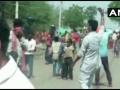 धक्कादायक! लसीकरणाबाबत जनजागृती करण्यासाठी गेलेल्या पथकावर गावकऱ्यांचा हल्ला - Marathi News | tehsildars team went for vaccination in ujjain had to run away after saving his life one was seriously injured | Latest national News at Lokmat.com