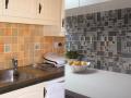 Kitchen Tips : किचनच्या टाईल्स रोज अस्वच्छ, चिकट होतात?; या टिप्सनं मिळवा चकचकीत, नव्या टाईल्स - Marathi News | Kitchen Tips : Easy tips to clean kitchen tiles in quick ways | Latest sakhi News at Lokmat.com