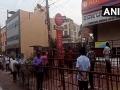 CoronaVirus News : दारूची दुकाने उघडली, मद्यप्रेमींच्या लांबच लांब रांगा! - Marathi News | CoronaVirus Marathi News : Long Queue Outside Liquor Shops In Hubli Before They Open In Lockdown rkp | Latest national News at Lokmat.com