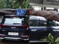 शिवसेना खासदाराच्या गाडीवर कोसळले झाड, गाडीचं मोठं नुकसान - Marathi News | Tree fell on Shiv Sena MP Omraje Nimbalkar's car, huge damage to the car | Latest mumbai Photos at Lokmat.com