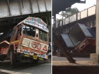 मुंबई : किंग्स सर्कल रेल्वे पुलाखाली अडकला कंटेनर - Marathi News | Mumbai : container truck met accident king circle railway bridge | Latest mumbai Photos at Lokmat.com