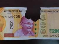 बँकेने फाटलेल्या नोटा बदलून देण्यास नकार दिला, लगेच करा हे काम; RBI चे नियम जाणून घ्या - Marathi News | Bank refuses to exchange torn notes, do this immediately; Know the rules of RBI | Latest business Photos at Lokmat.com