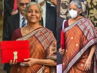 Budget 2022: बजेटपेक्षाही चर्चा अर्थमंत्र्यांच्या साडीची! सीतारामन यांच्या खास साडीनं वेधलं सर्वांचं लक्ष, जाणून घ्या किंमत आणि महत्व... - Marathi News | Nirmala sitharaman wear rusty brown saree for her fourth budget presentation union budget 2022 know price and details | Latest business Photos at Lokmat.com