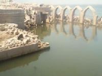 उजनी धरणाची पातळी घटली, पाण्यात बुडालेल्या पुरातन मंदिरांचे अवशेष पाण्याबाहेर - Marathi News | Ujani dam level decreases, the remains of ancient temples buried in water remain outside the water | Latest maharashtra Photos at Lokmat.com