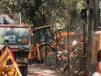 RSS मुख्यालयाच्या पार्किंगसाठी प्राचीन मंदिरावर बुलडोझर?; स्थानिकांचा आक्रोश, लोक संतापले - Marathi News | Bulldozers on ancient temple for parking of RSS headquarters; Locals protest, people are angry | Latest national News at Lokmat.com