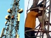पत्नीच्या अफेअरला कंटाळला; आत्महत्येसाठी लेकीला सोबत घेत मोबाईल टॉवरवर चढला तरूण; अन् मग.... - Marathi News | Rampur man climbed mobile tower with minor create drama | Latest social-viral Photos at Lokmat.com
