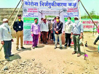 Disinfection room in Manmad's vegetable market | मनमाडला भाजीबाजारात निर्जंतुकीकरण कक्ष