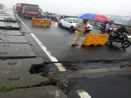 The Saket bridge connecting the Mumbai-Nashik highway to the top, the repair work started | मुंबई - नाशिक महामार्गाला जोडणाऱ्या साकेत पुलाला तडे, दुरुस्तीचे काम सुरु