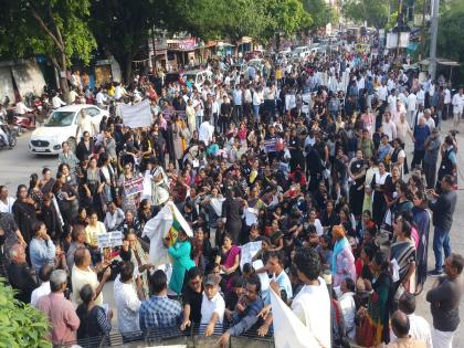 A silent march was held in Wardha against the initiatives of 40 social organizations | ४० सामाजिक संस्थांच्या पुढाकारांना वर्धा येथे निघाला निषेध मूक मोर्चा