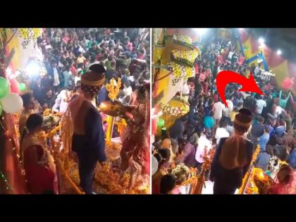 Bride performing the groom jaimala guests slapping each other viral video | VIDEO : स्टेजवर नवरदेवाला ओवाळत होती नवरी, खाली पाहुण्यांनी सुरू केला राडा आणि मग...