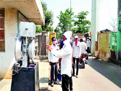 Disinfection by the spraying machine | लासलगावी अत्तर फवारणी यंत्राद्वारे निर्जंतुकीकरण