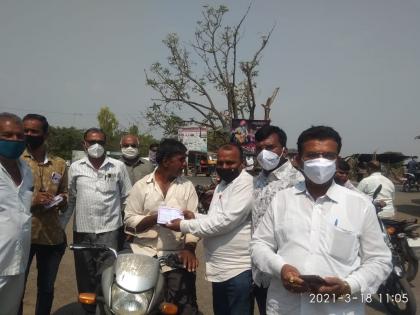 Lohoner Gram Panchayat fines those who walk without masks | लोहोणेर ग्रामपंचायतीकडून विनामास्क फिरणाऱ्यांना दंड