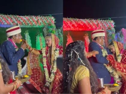 Viral Video : Groom forcefully feed Rasgulla to bride, know the reaction | VIDEO : नवरदेवाची स्टेजवरच नवरीसोबत जबरदस्ती, तोंडात कोंबला रसगुल्ला आणि मग...