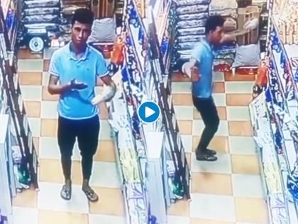 Funny viral video : Man theft in shopping store viral video | Video: आधी चोरी...मग कॅमेरा बघून डान्स करू लागला चोर, व्हिडीओचा सोशल मीडियावर धुमाकूळ